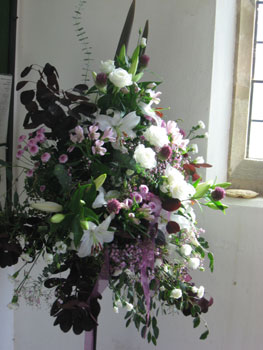 flowers left over from the wedding, st john's, west bay, dorset